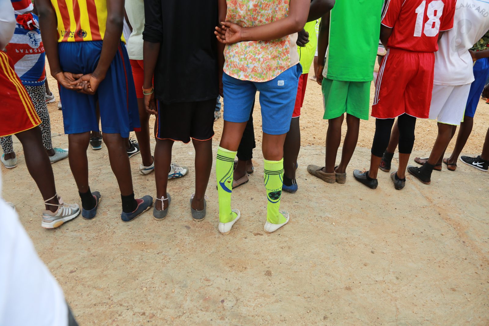 A lineup of runners in their race kits